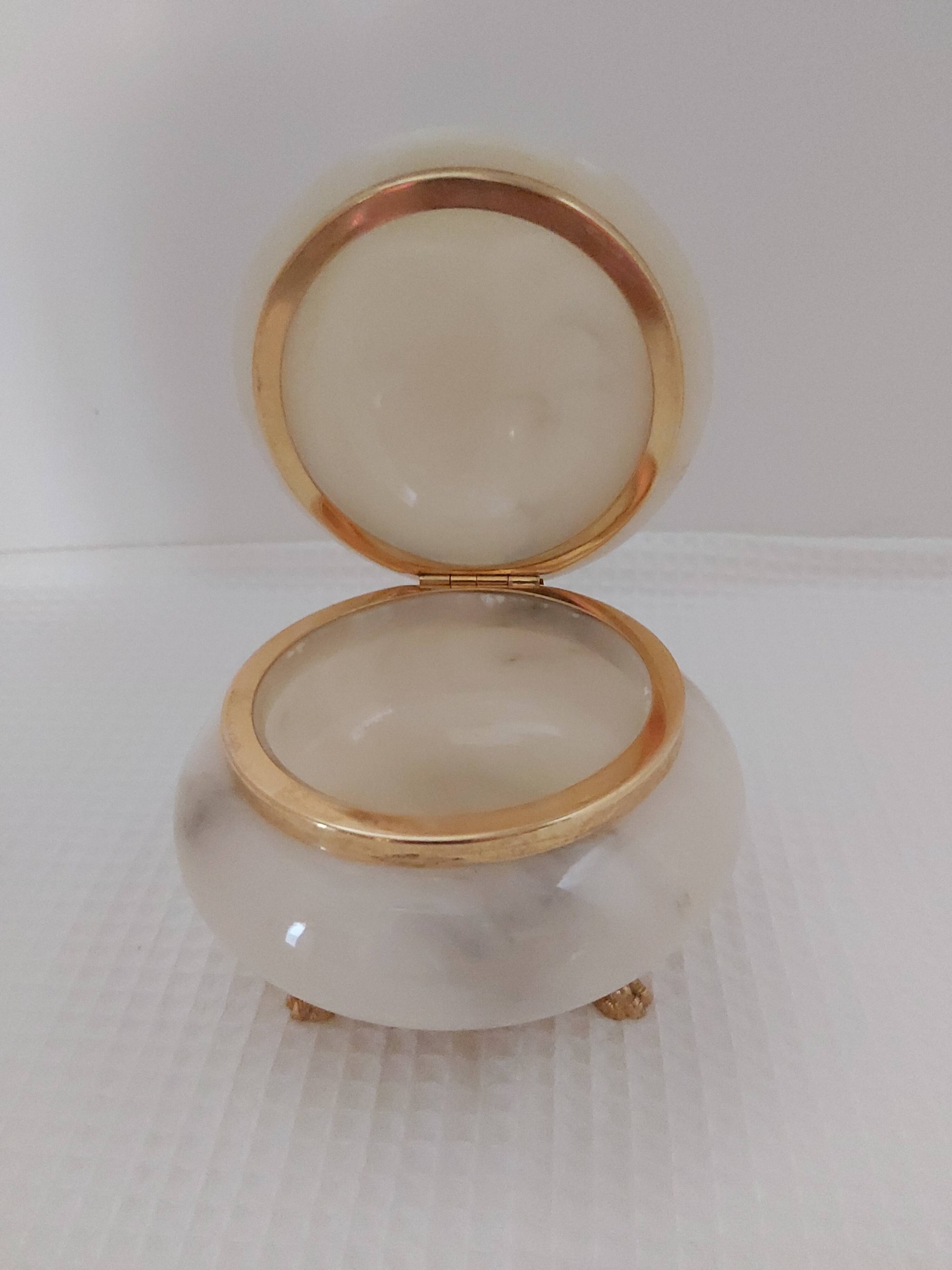 Ivory-colored alabaster box on feet