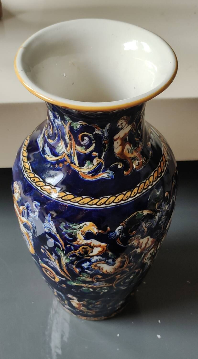 Twisted design vase. Signed Gien France/Renaissance blue background 26 x 13cm