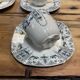 6 cups and saucers in Gien earthenware with Mascaron decoration from the early 20th century.