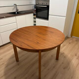 Wooden round table with butterfly extension from the 1970s.