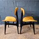 2 vintage chairs in black lacquered wood and yellow/mustard fabric, 1960