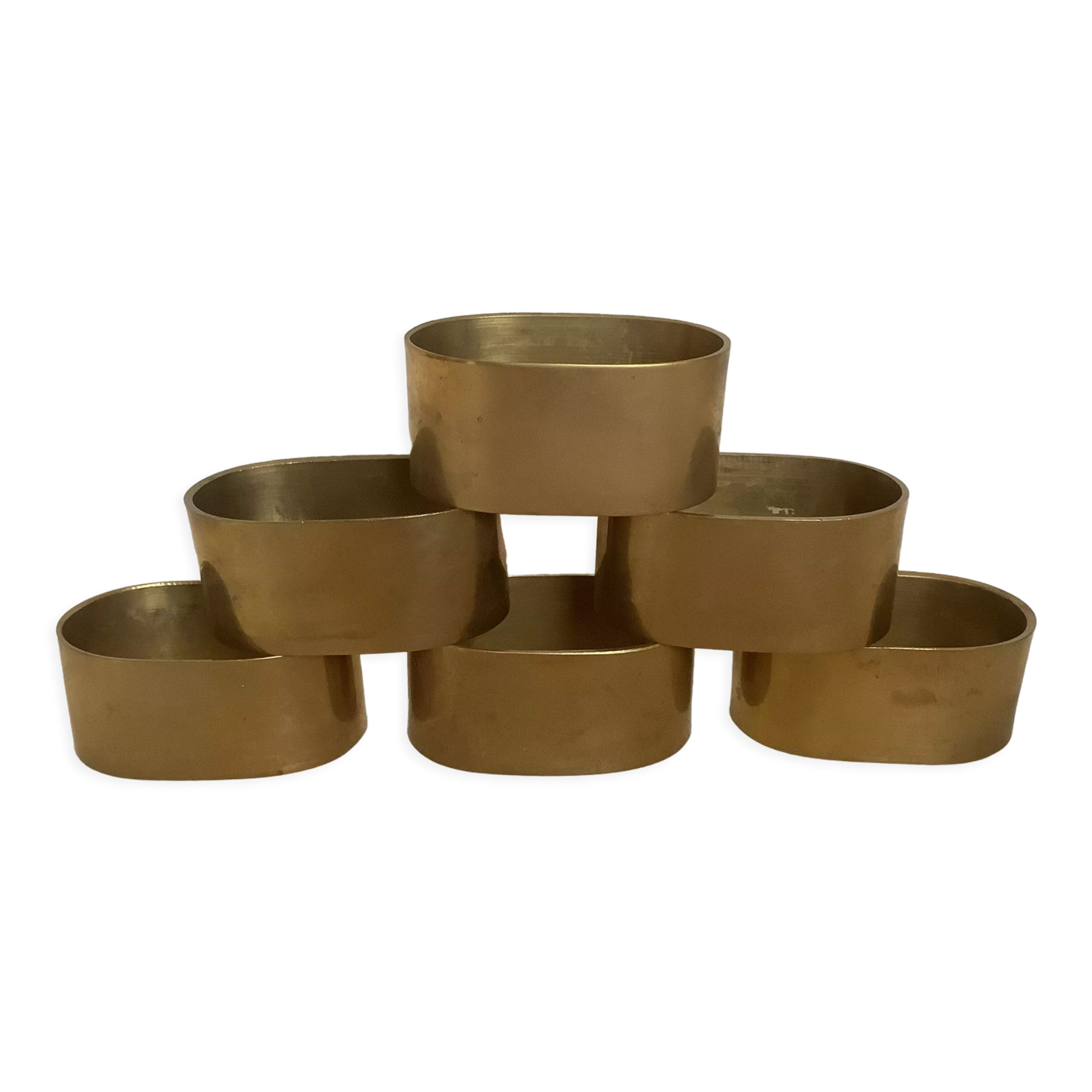 Six old brass napkin rings