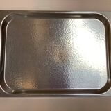 Small hammered metal and wood tray in Scandinavian style.