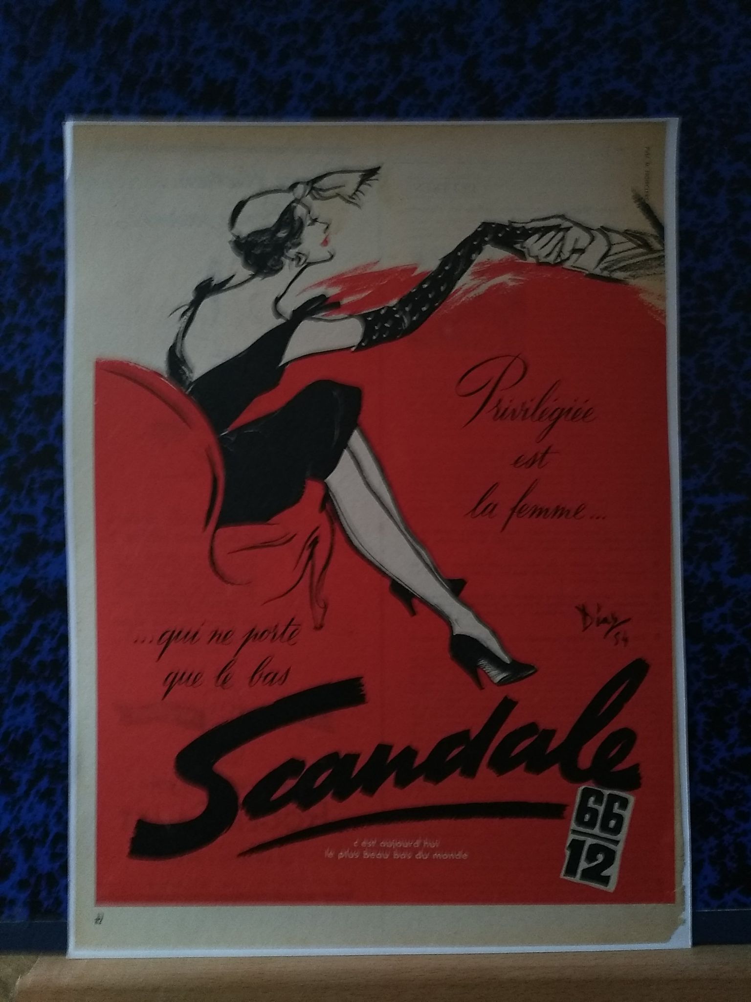 A paper advertisement for women's stockings marks scandal issue period review
