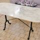 Table de bistrot godin en marbre blanc cassé oval fer forgé