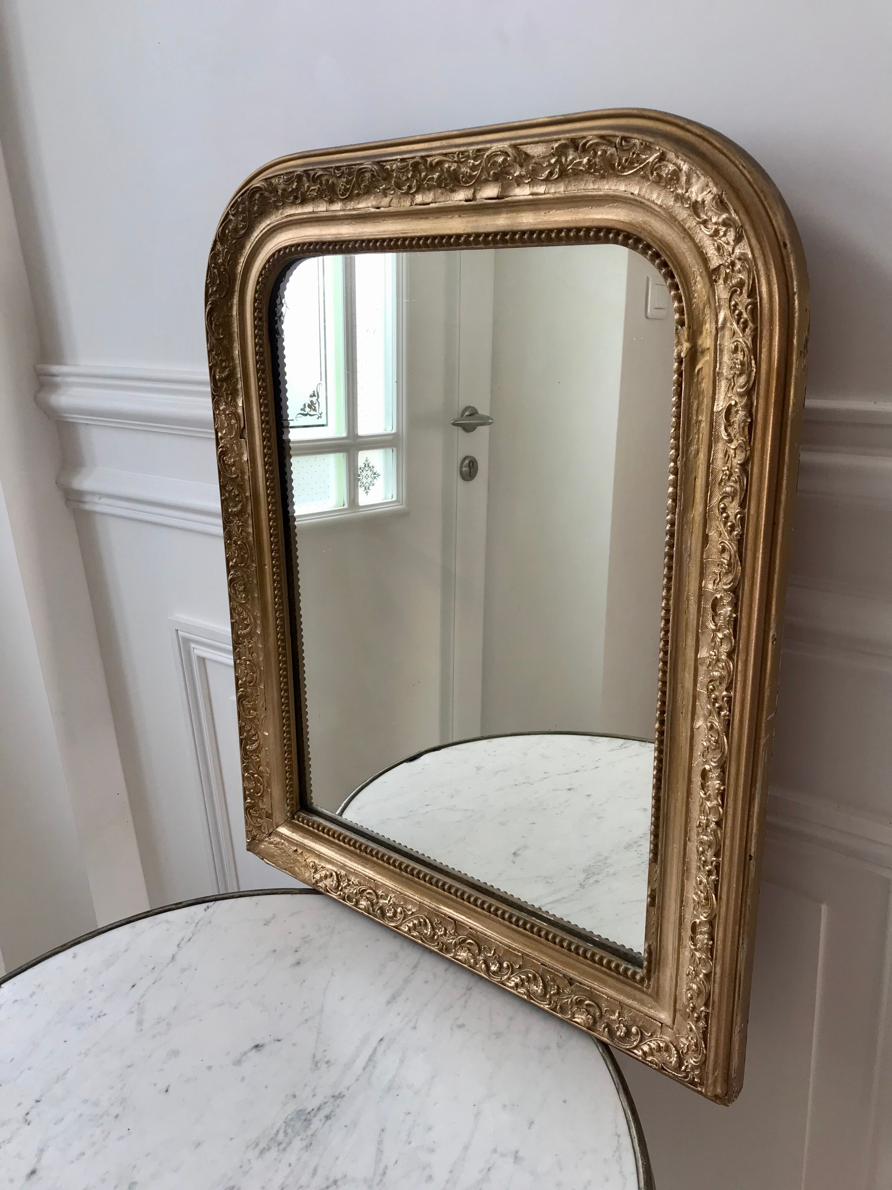 Wooden mirror and gilded stucco early twentieth century