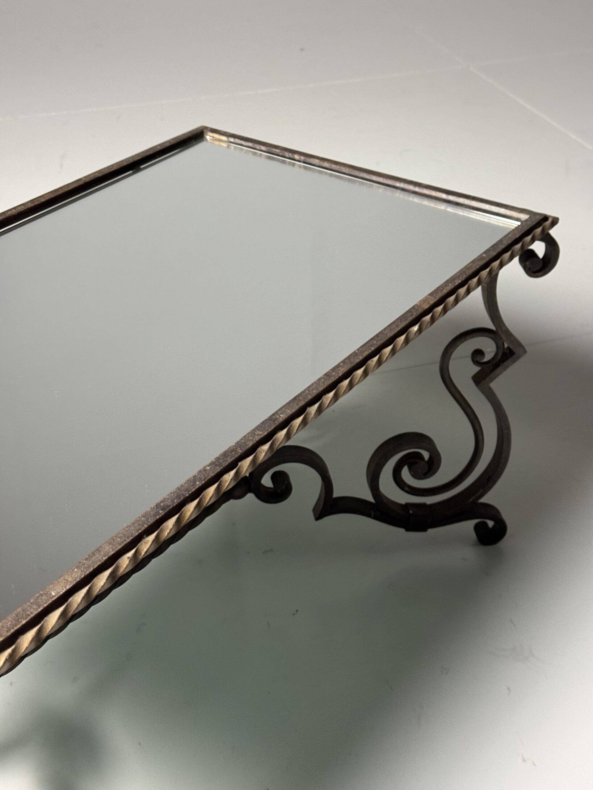 Wrought iron coffee table with mirror glass