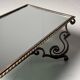 Wrought iron coffee table with mirror glass