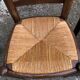 Duo of vintage rustic straw straw chairs in oak.