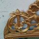 Antique gilded wooden mirror in Louis XVI style