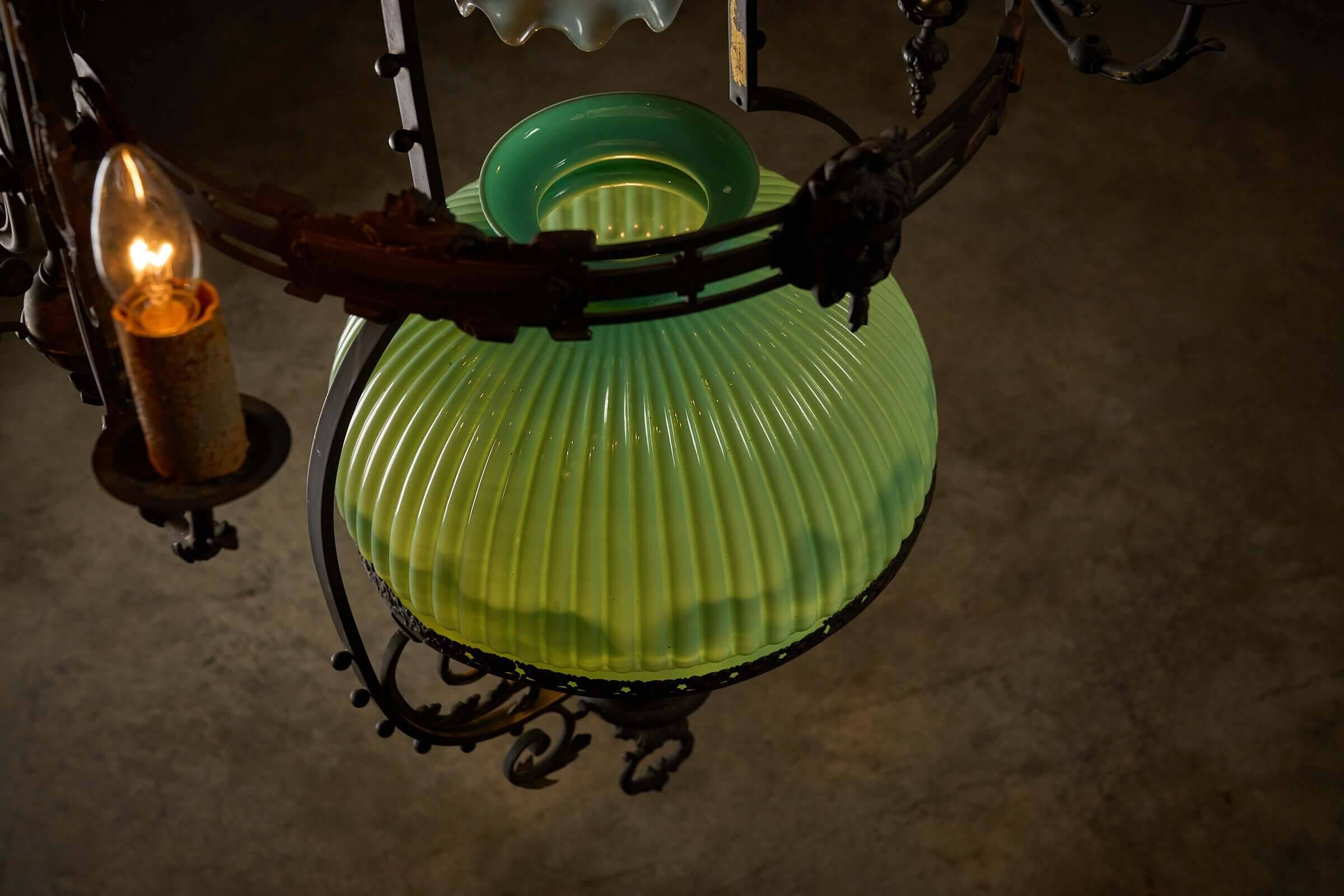 Antique adjustable height chandelier with original glasswork and brass detailing