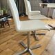 Extendable round table in white formica and 4 matching chairs by Roche Bobois.