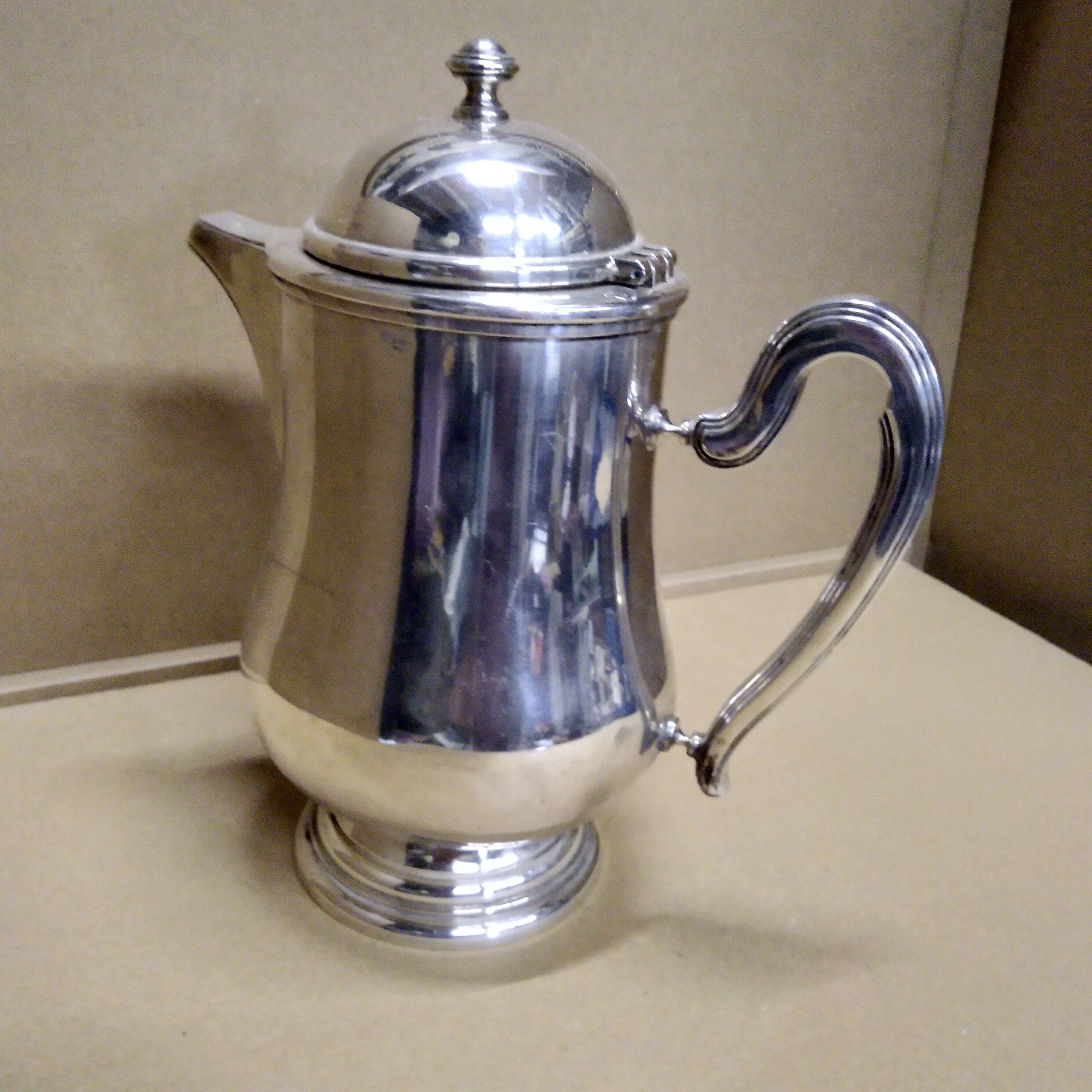 Italian hotel teapot made of silver metal