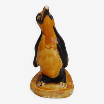 Small plaster penguin statue