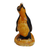Small plaster penguin statue