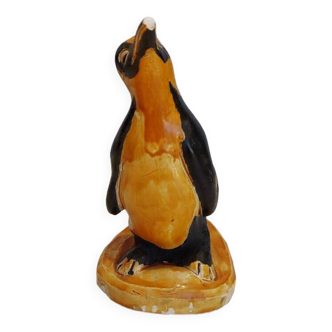 Small plaster penguin statue