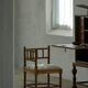 Antique French corner chair handcrafted with lamb's wool, early 20th century.