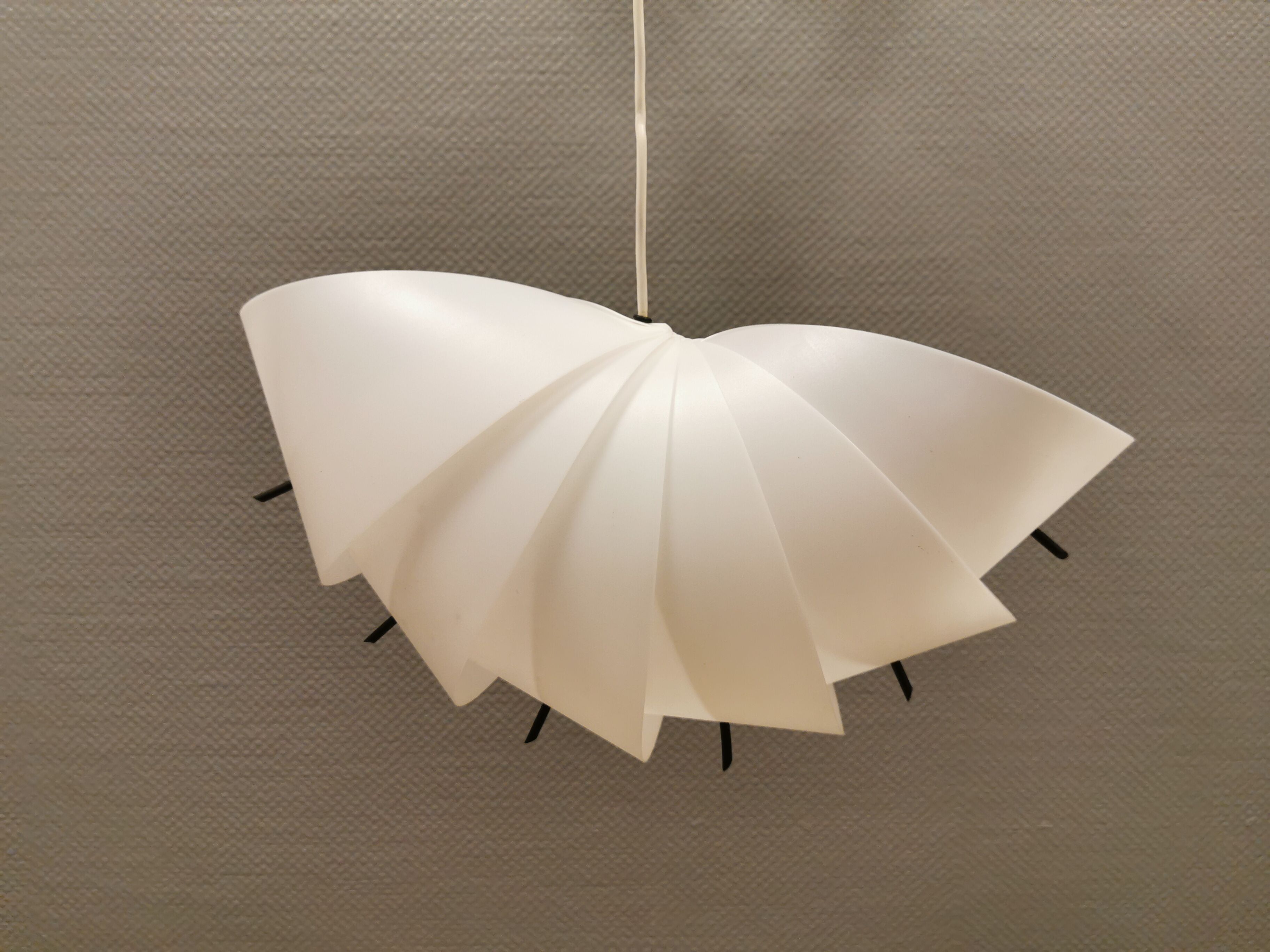 Danish conch, snail shell hanging lamp from the 80s, made of hard ABS plastic.
