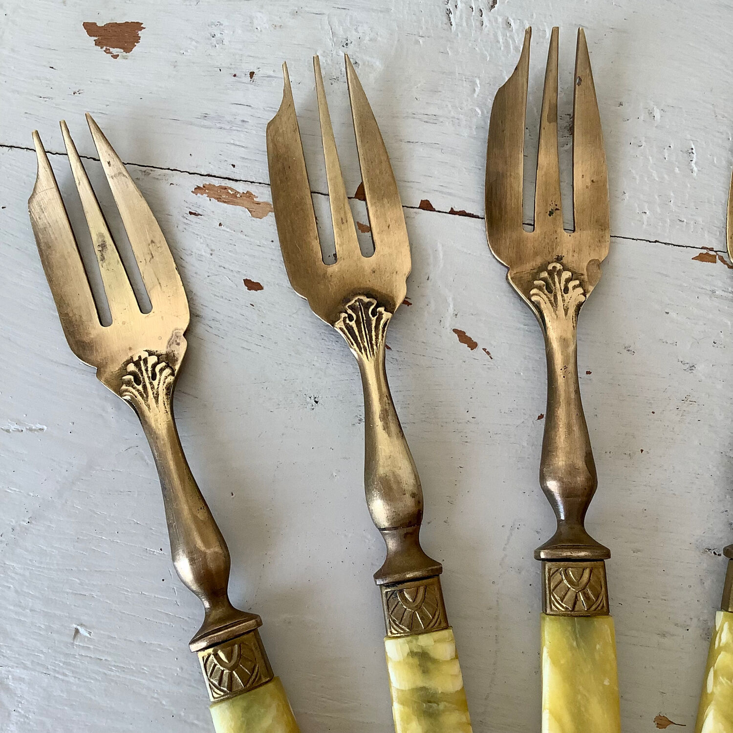 Brass and bakelite dessert cutlery