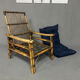 Fauteuil en rotin et son assise neuve extérieure