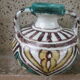 Coloured ceramic vase: arabesques, with Arabic inscription