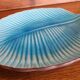 Turquoise leaf-shaped presentation plate