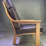 Chocolate leather armchair, wooden structure