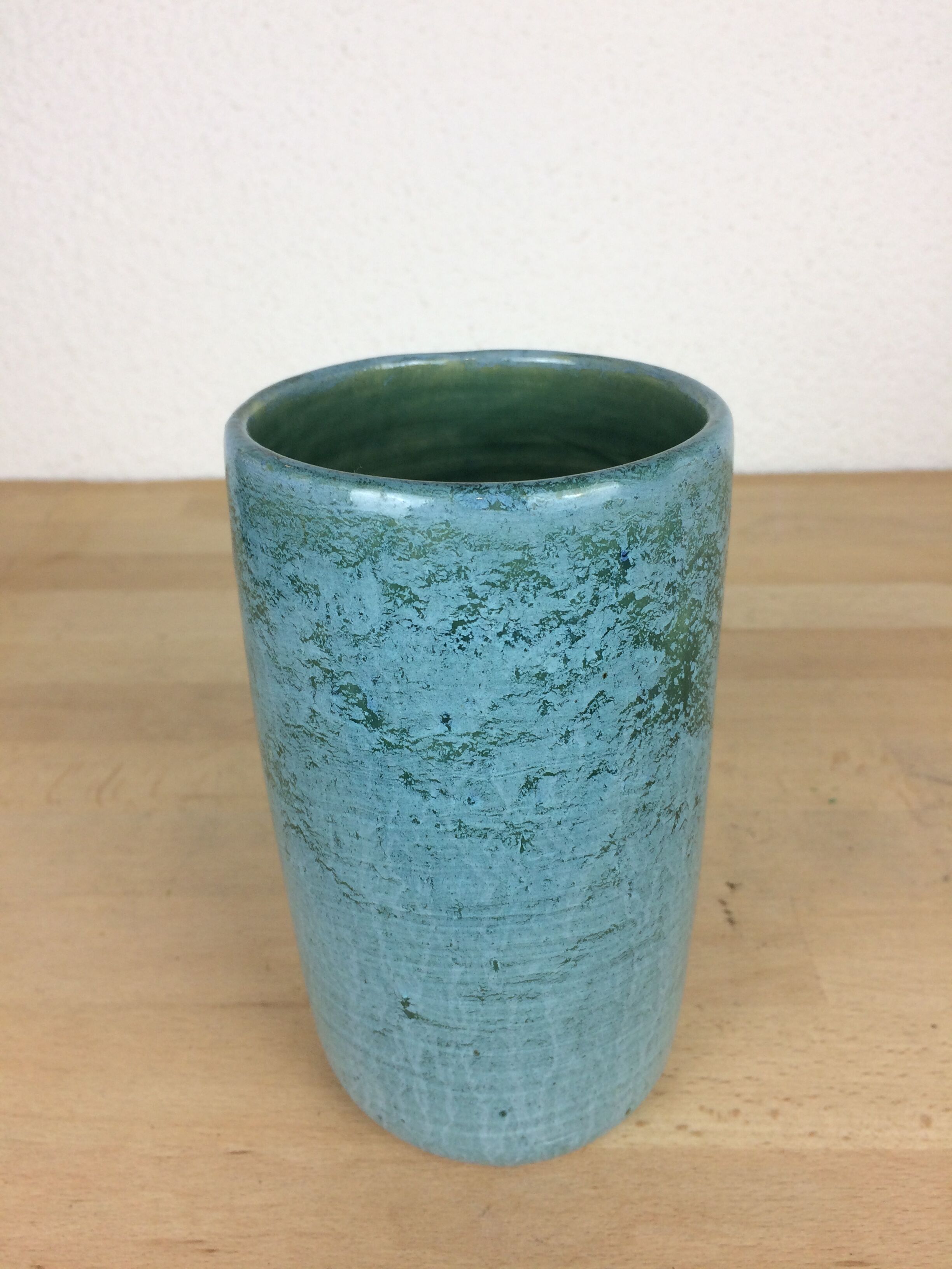 Blue ceramic roller vase
