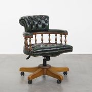 Dark green cowhide leather and wood chesterfield office chair on wheels