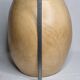 Brutalist monoxyle stool in solid mango wood with an organic shape.