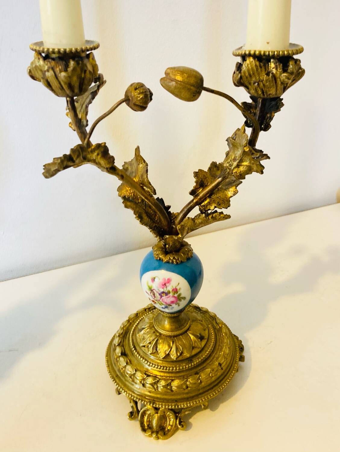 19th century candle holders in gilded bronze and porcelain