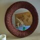 Round mirror, dark rattan