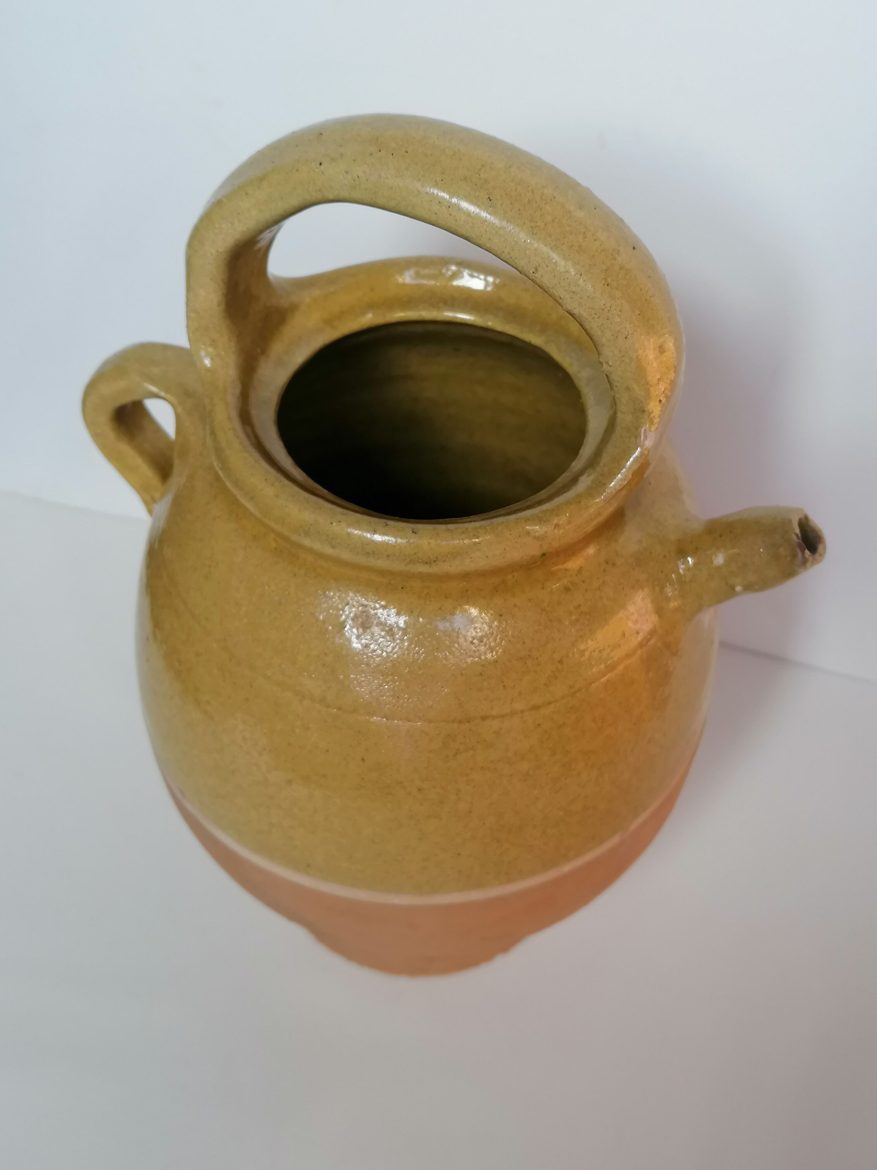 Yellow enamelled gargulette jug