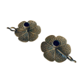 Pair of brass clover candlesticks