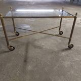 Rolling coffee table in vintage gilded bronze
