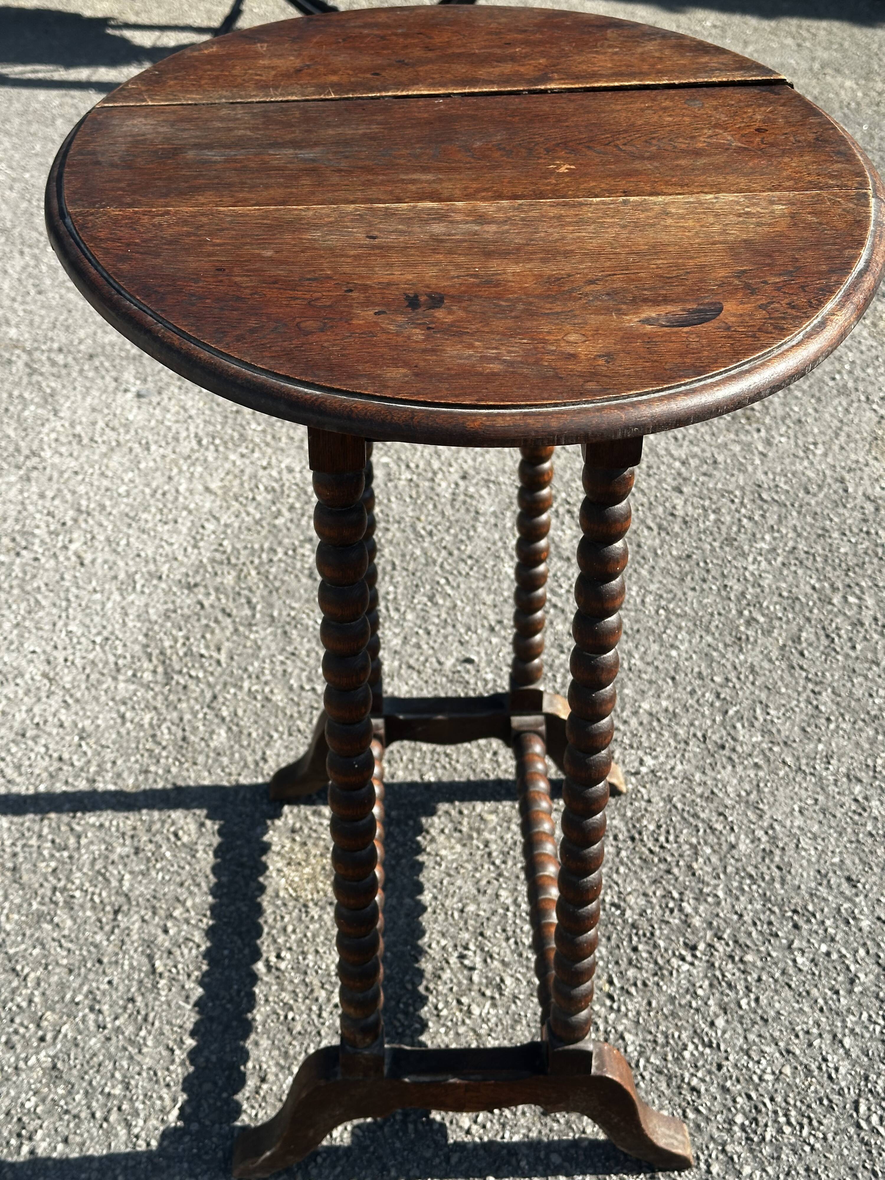 Small folding table called Gateleg, Victorian era