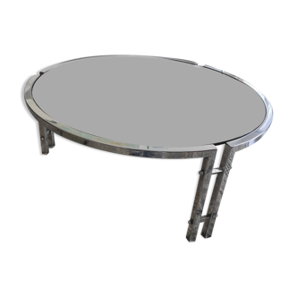 Round coffee table in smoked glass with chrome legs