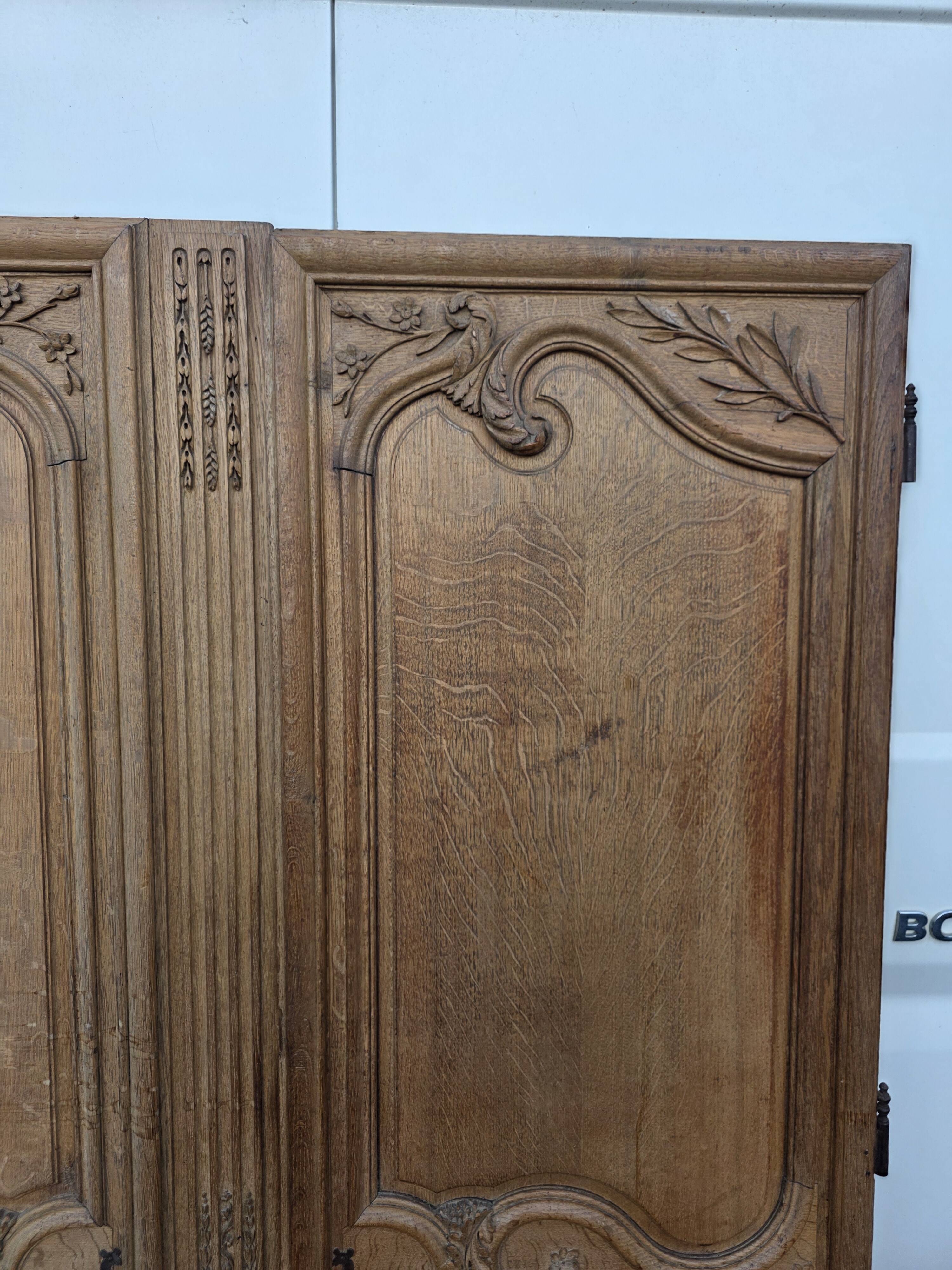Pair of solid oak wardrobe doors from the 19th century.