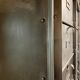 Industrial cladding furniture in brushed and patinated steel