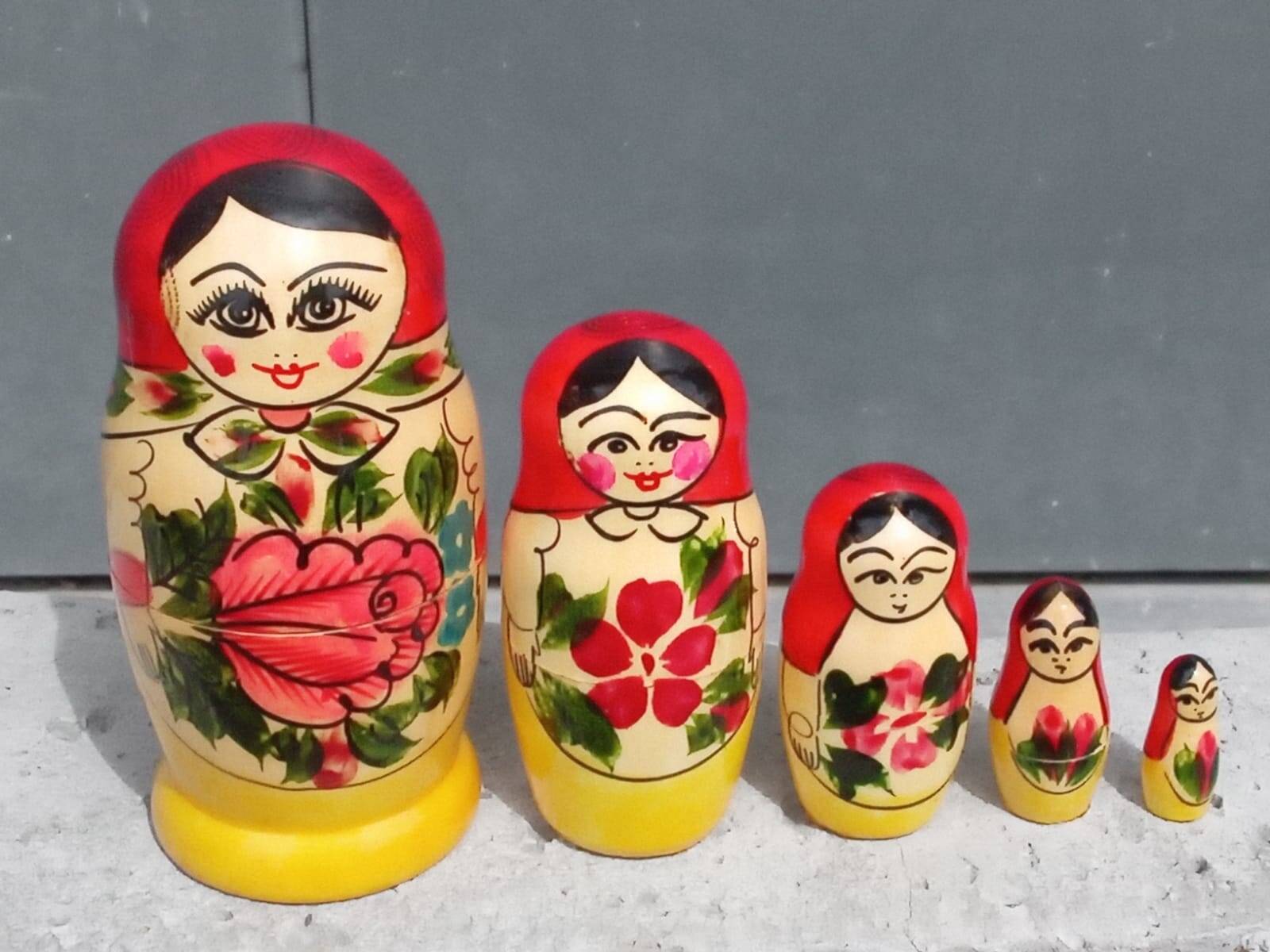 Decorative Russian Matryoshka dolls made of hand-painted wood.