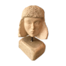 Sculpture tête en pierre taillée