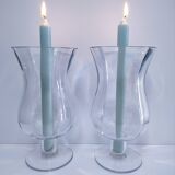 Pair of tall clear glass candlesticks from the early 20th century