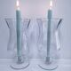 Pair of tall clear glass candlesticks from the early 20th century