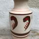Antique beige ceramic vase with decorative painting