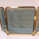 Vintage fireplace screen in smoked glass and gold-tone metal