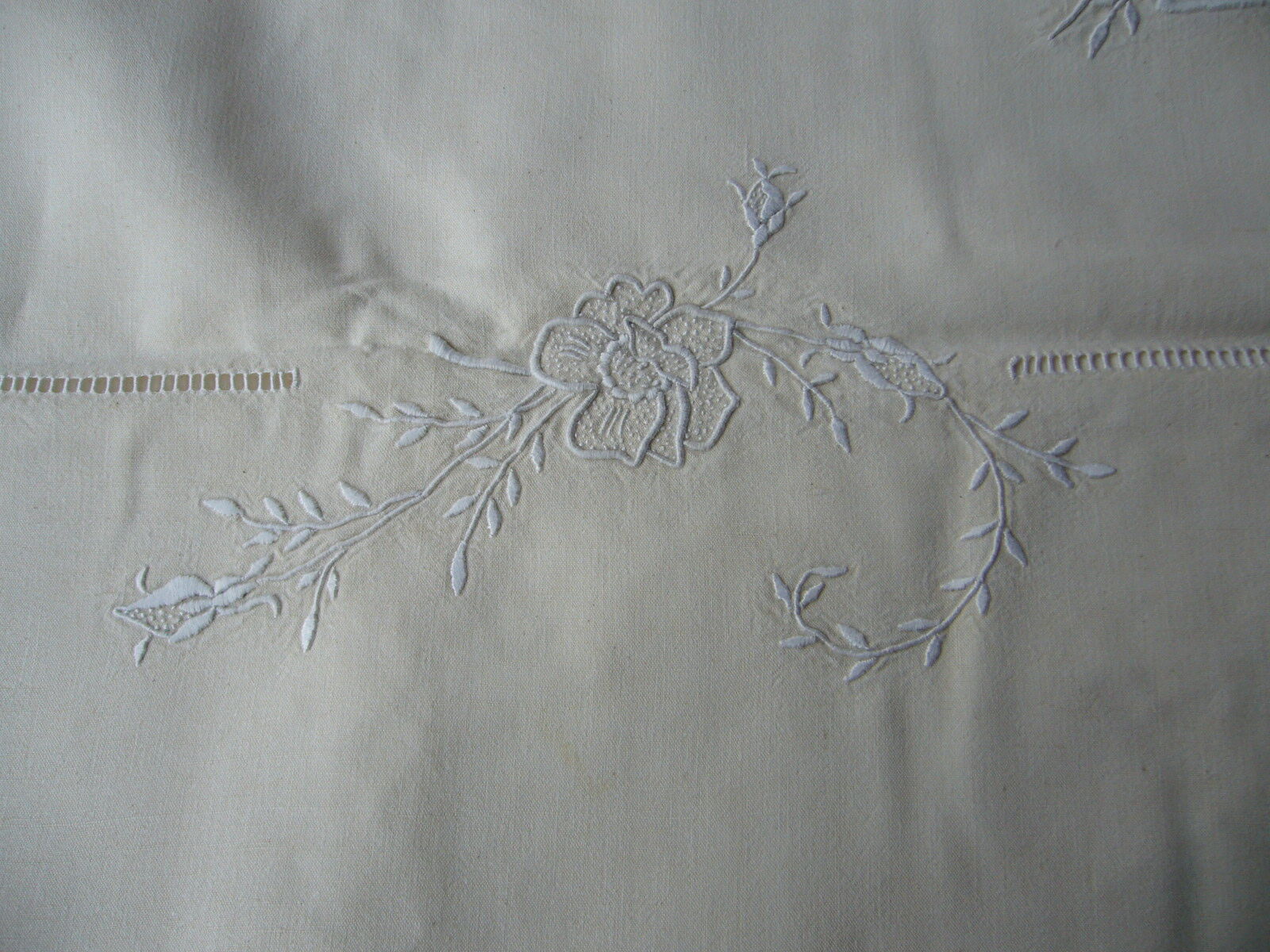 Old linen sheets embroidered with flowers