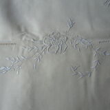 Old linen sheets embroidered with flowers