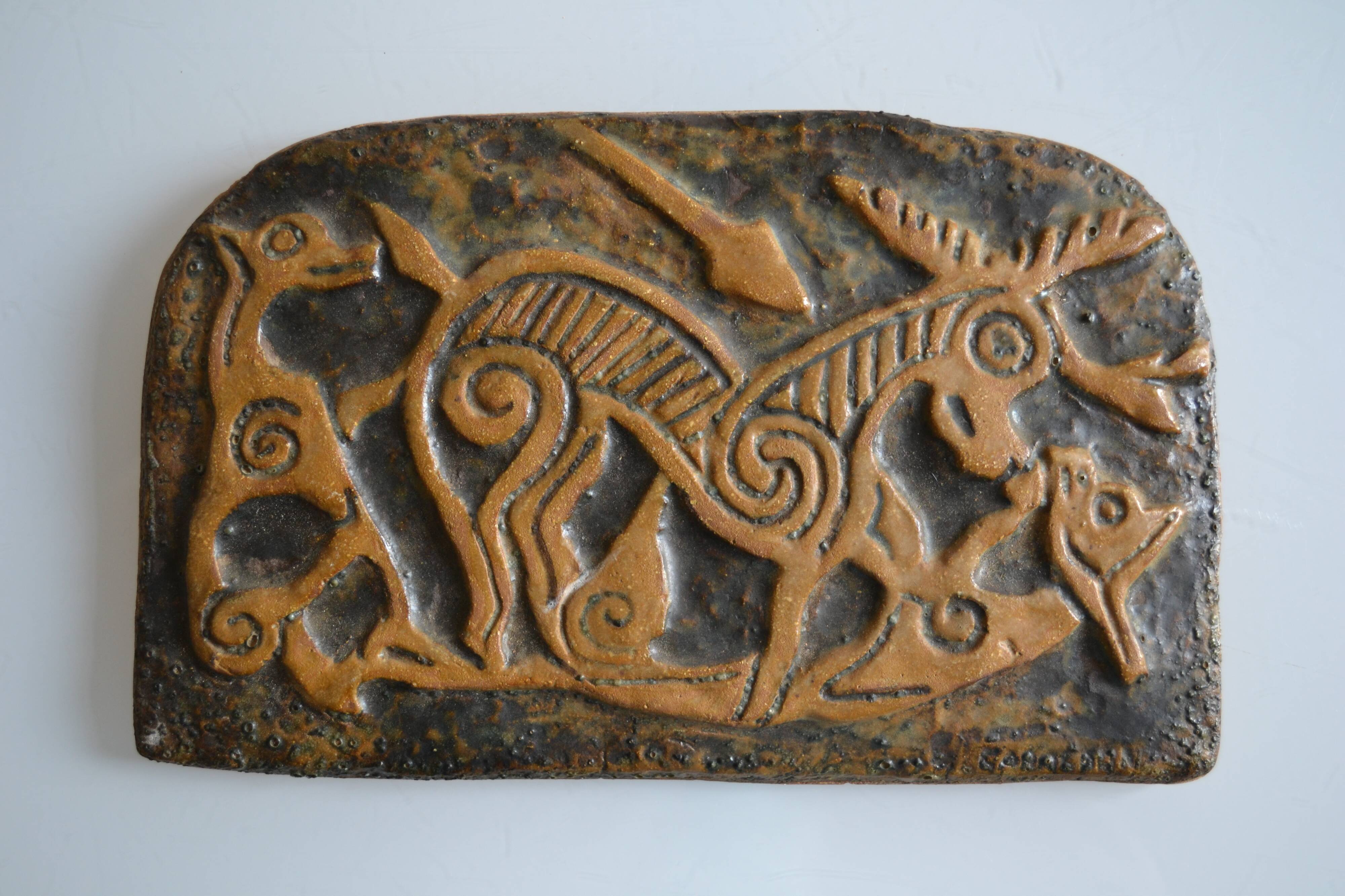 Bas-relief sculpture in terracotta inspired by the Celtic bestiary