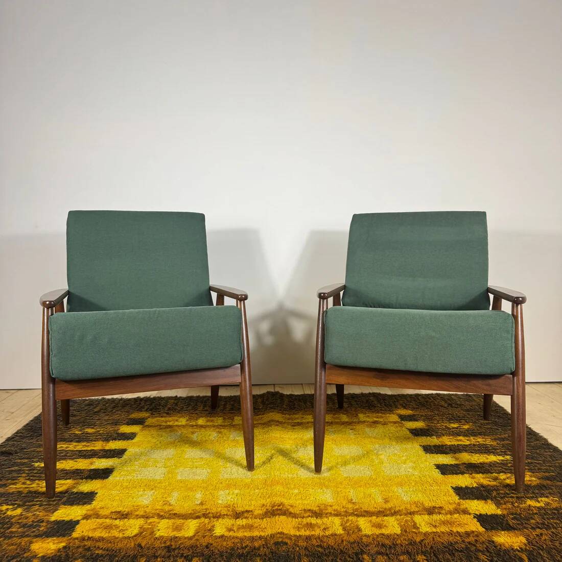 Pair of teak armchairs with green cushions – vintage Scandinavian design
