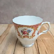 English porcelain cup Crown Staffordshire Denbigh – Bird and flowers
